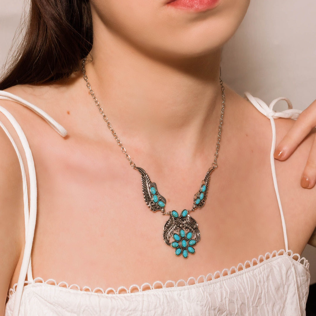 Silver-tone Wings Turquoise Bloom Necklace