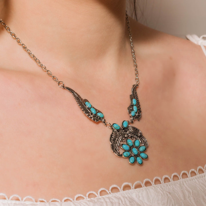 Silver-tone Wings Turquoise Bloom Necklace